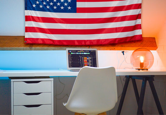 hanging USA flag above a work desk