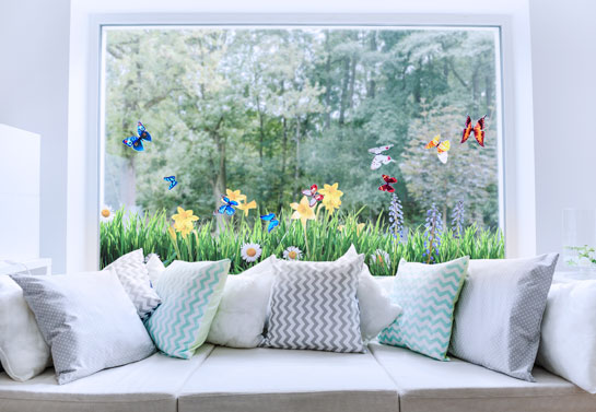 Holiday window idea with adhesive flower prints for Easter