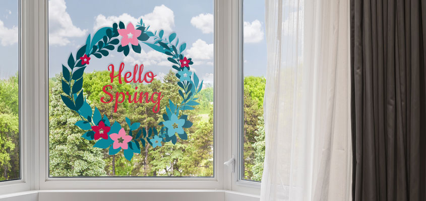 spring themed home window decorating idea with decals