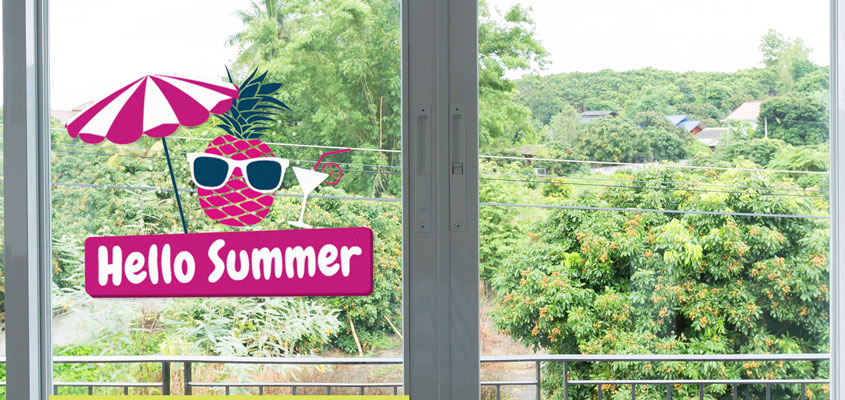 summer themed home window decorating idea with decals
