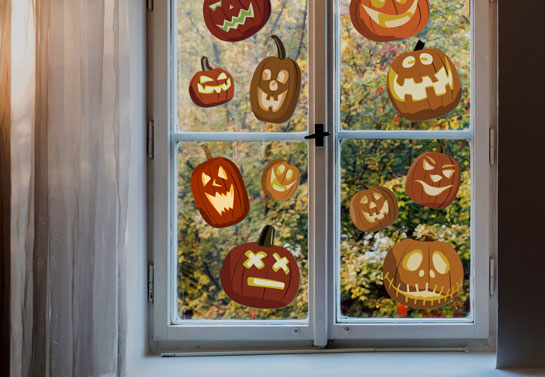 Jack-O’-Lanterns cute Halloween window decor