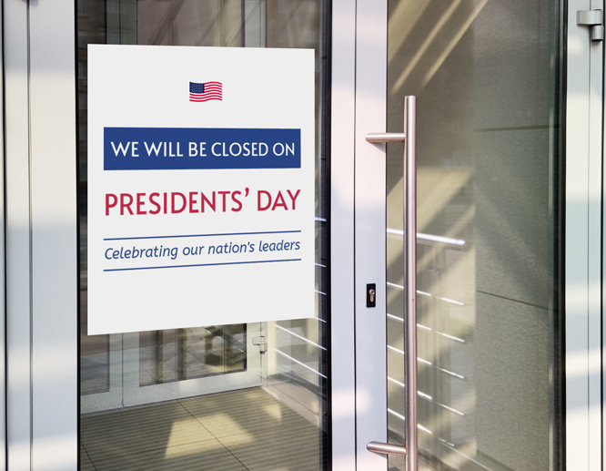 Simple closed for Presidents' Day sign displaying a note attached to the storefront door