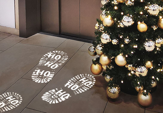easy Christmas decorations for the office floor with snowy footprints