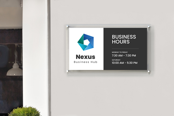Nexus Business Hub plastic sign displaying hours, brand name, and modern logo design.