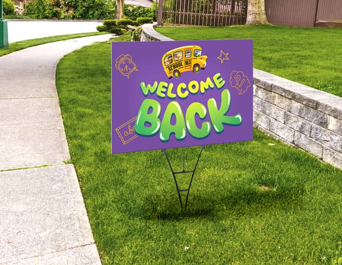 Rectangular-shaped back to school yard sign in purple displaying a welcoming text