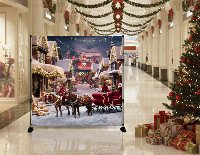 A large Christmas backdrop for a photoshoot is installed inside the mall, exhibiting Santa Claus and his reindeer