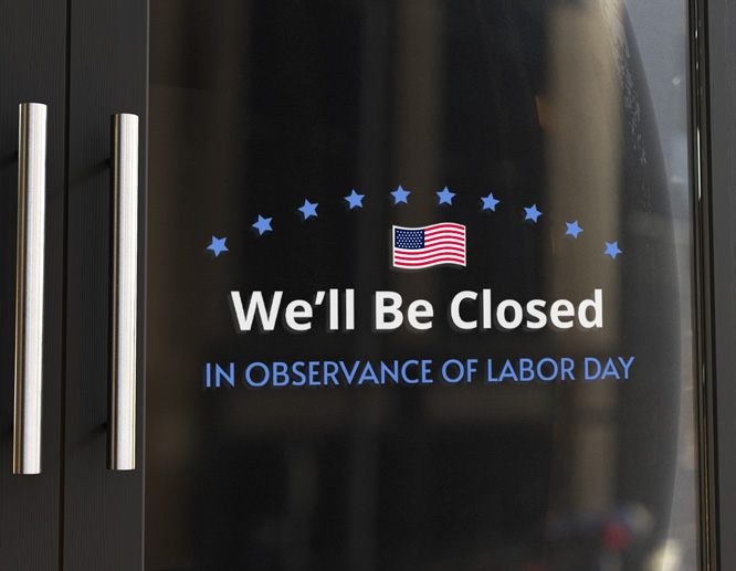 Bank closed in observance of Labor Day sign in the form of letters applied to a glass door