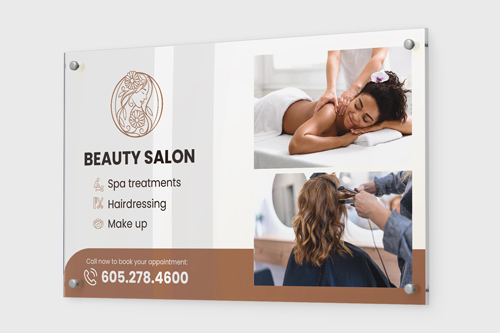 Advertising acrylic sign with standoffs for a beauty salon