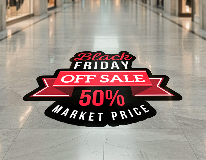 Black Friday 50% off sale floor decal in red and black placed in a modern shopping mall.
