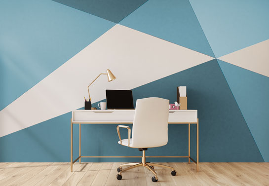 home office in blue color with geometric wall prints