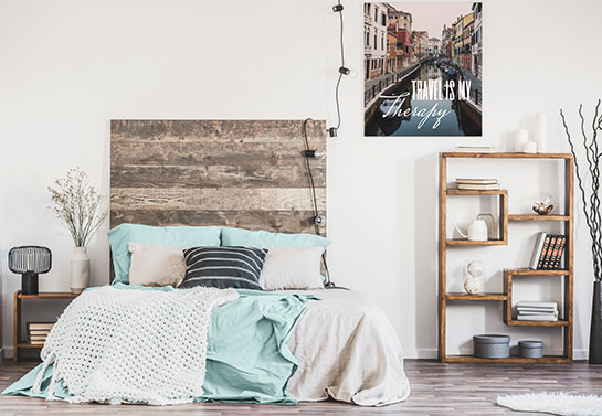 guest room idea with a bookshelf near the bed