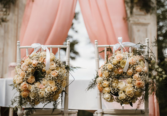 outdoor wedding chair flower decor