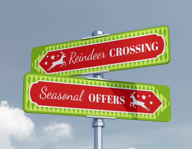 Reindeer Crossing and Seasonal Offers directional Christmas pole sign with arrows pointing to different directions.