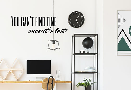 office guest room idea with a decorative wall clock and quote print