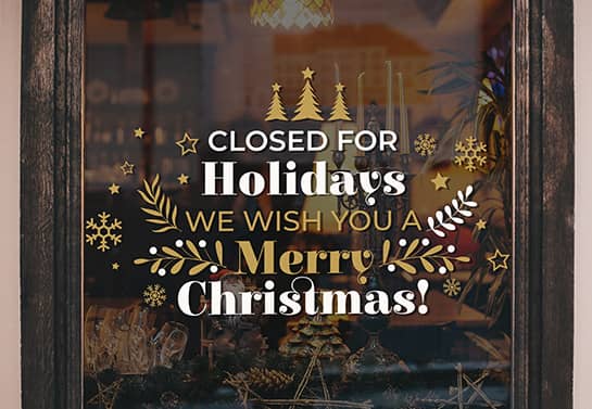 store closed for Christmas sign in gold and white with a congratulatory note