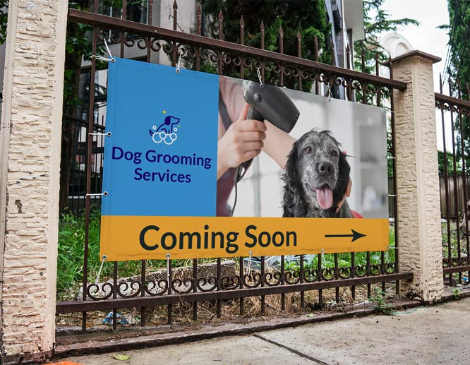 Fence-attached dog grooming banner presenting grand-opening illustrations