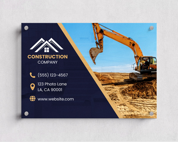 An acrylic sign for a construction company featuring an image of an excavator.