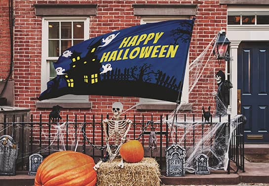 outdoor Happy Halloween flag banner in blue with a ghost house display