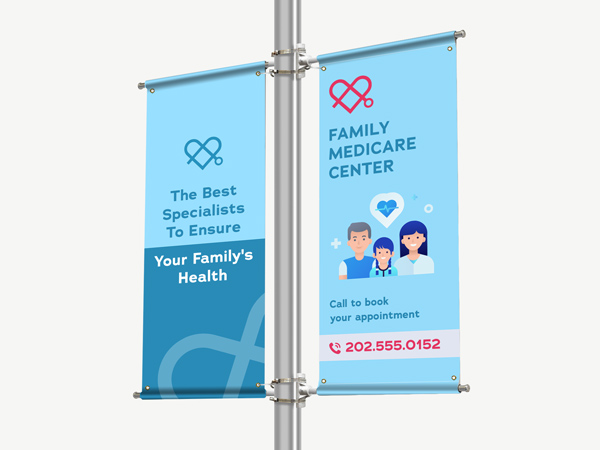 Custom banners on a pole displaying a medical center's branding and contact details