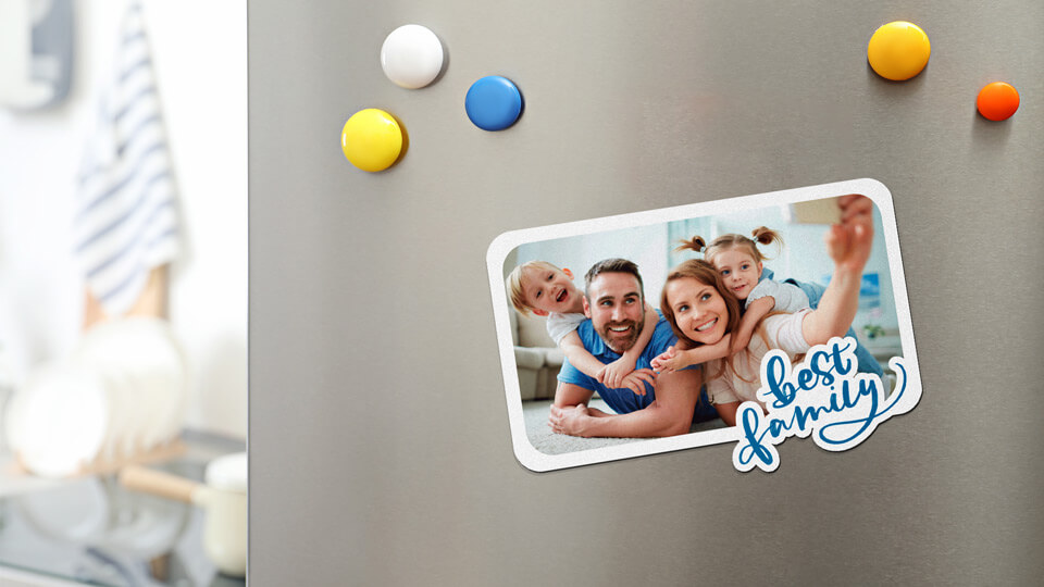 Custom-cut magnetic sign with a family photo print and a text