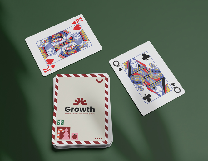 Customized playing cards for Christmas, reading "Growth" on the back of the cards