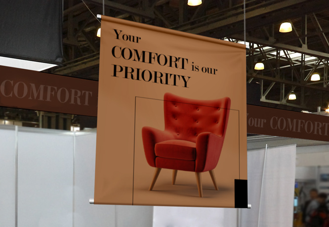Fabric graphics in brown with a 3D chair and a brand motto promoting a furniture company