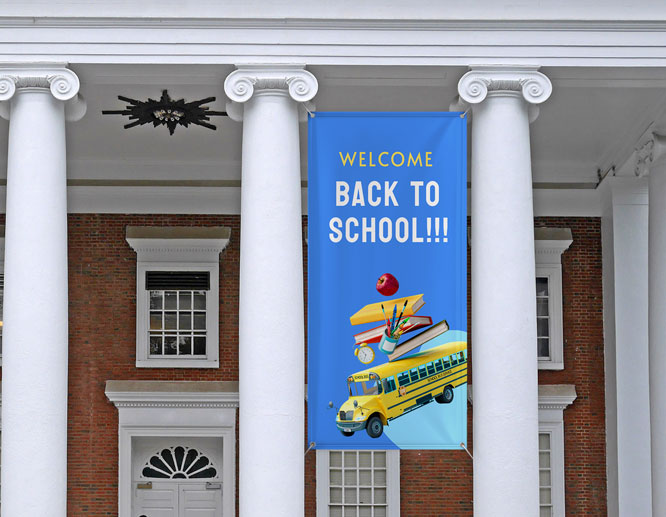 Decorative back to school sign in blue hanging from the school facade