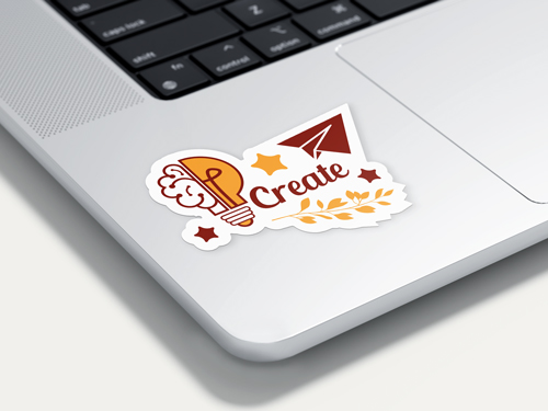 Decorative custom-shaped die cut sticker on the inner surface of a laptop.