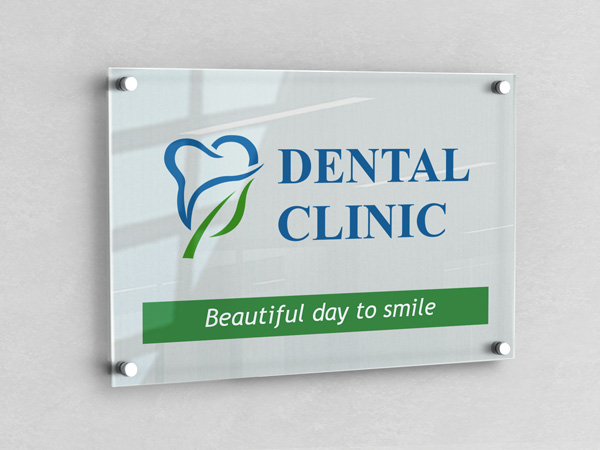 Sleek acrylic sign for a dental clinic reading Beautiful Day to Smile