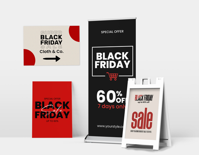 A collection of black friday signs including a retractable banner, poster, a-frame, and foam board sign.