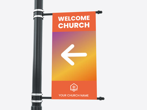 Church welcome sign on pole with white left-pointing arrow