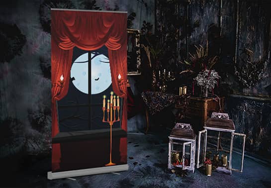 Dracula-themed Halloween backdrop in a dark room