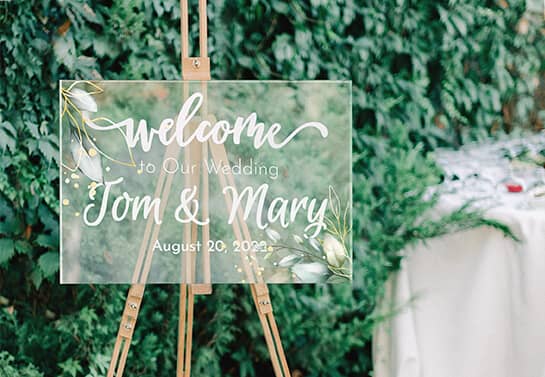 elegant wedding welcome sign idea with floral elements