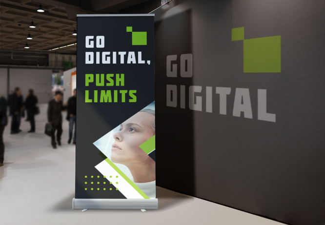 Promotional graphics in black with white and green lettering placed next to the wall