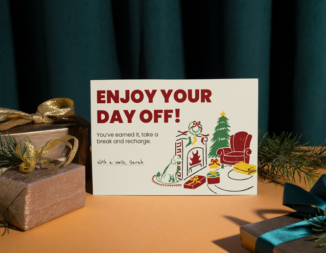 A personalized Christmas gift card reading "Enjoy Your Day Off" and showcasing Christmas graphics
