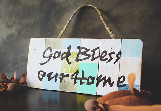 farmhouse wood sign idea multicolored with the phrase God Bless Our Home