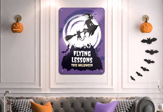 funny Halloween witch sign in purple displayed on the wall