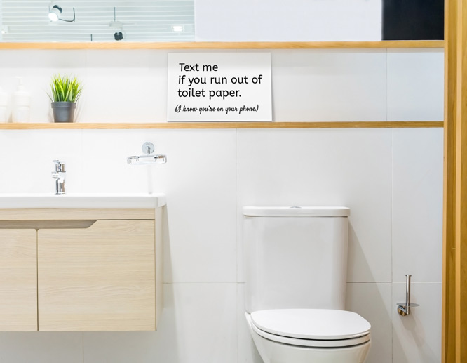 Funny motivational quotes wall art in white in the bathroom