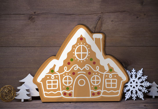 Gingerbread Christmas sign made of wood placed on a shelf