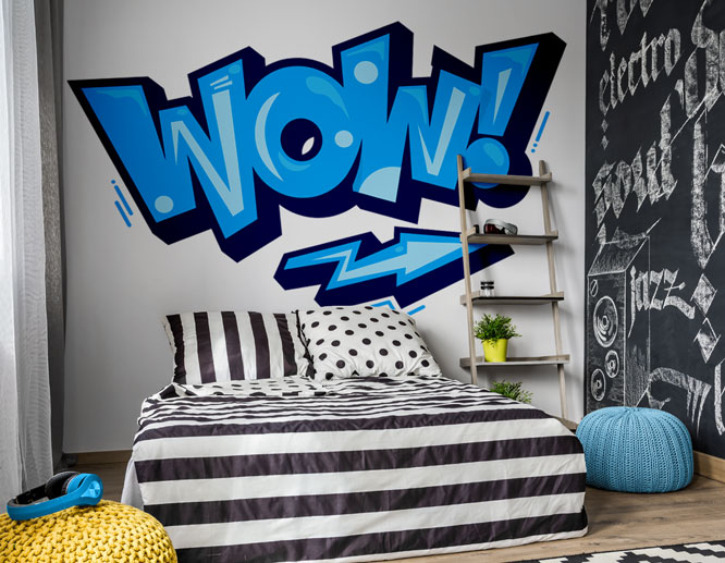 graffiti-styled peel and stick bedroom accent wall art in blue