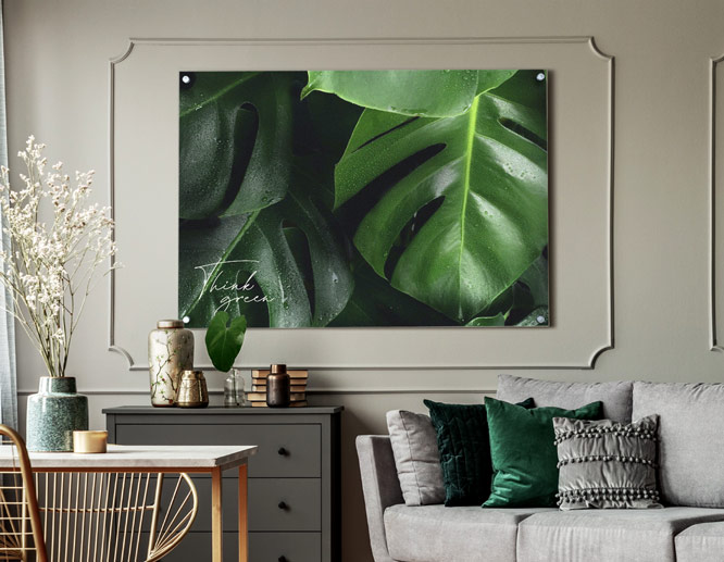 large trendy wall art with plant imagery in dark green
