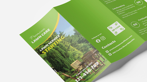 Brochure printing paper material designed for lawn care featuring a green yard and contact details