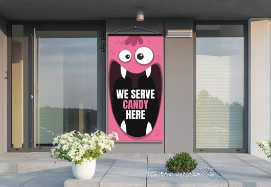 cute pink Halloween sign in a large size hung in the front door area