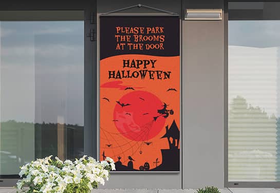 front door Happy Halloween hanging banner in black and orange