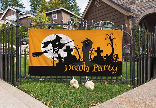 yellow and black Halloween party sign at the front of the house