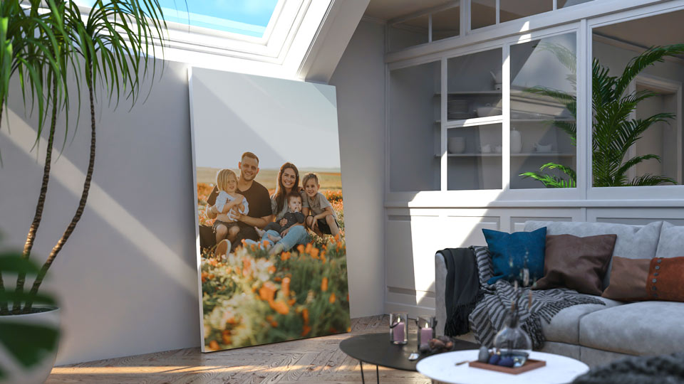 Family-themed large canvas print leaning against the living room wall