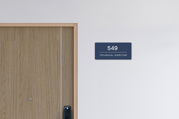 Dark blue indoor office sign displaying room number and the title Technical Director.