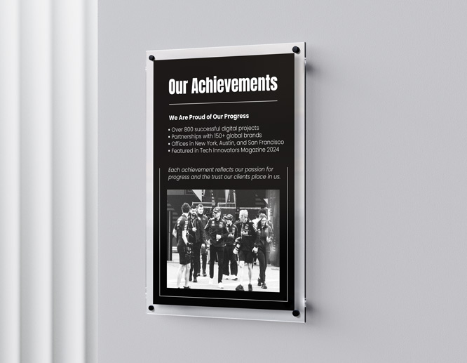 Informational acrylic plaque showcasing the company's achievements along with the staff's image