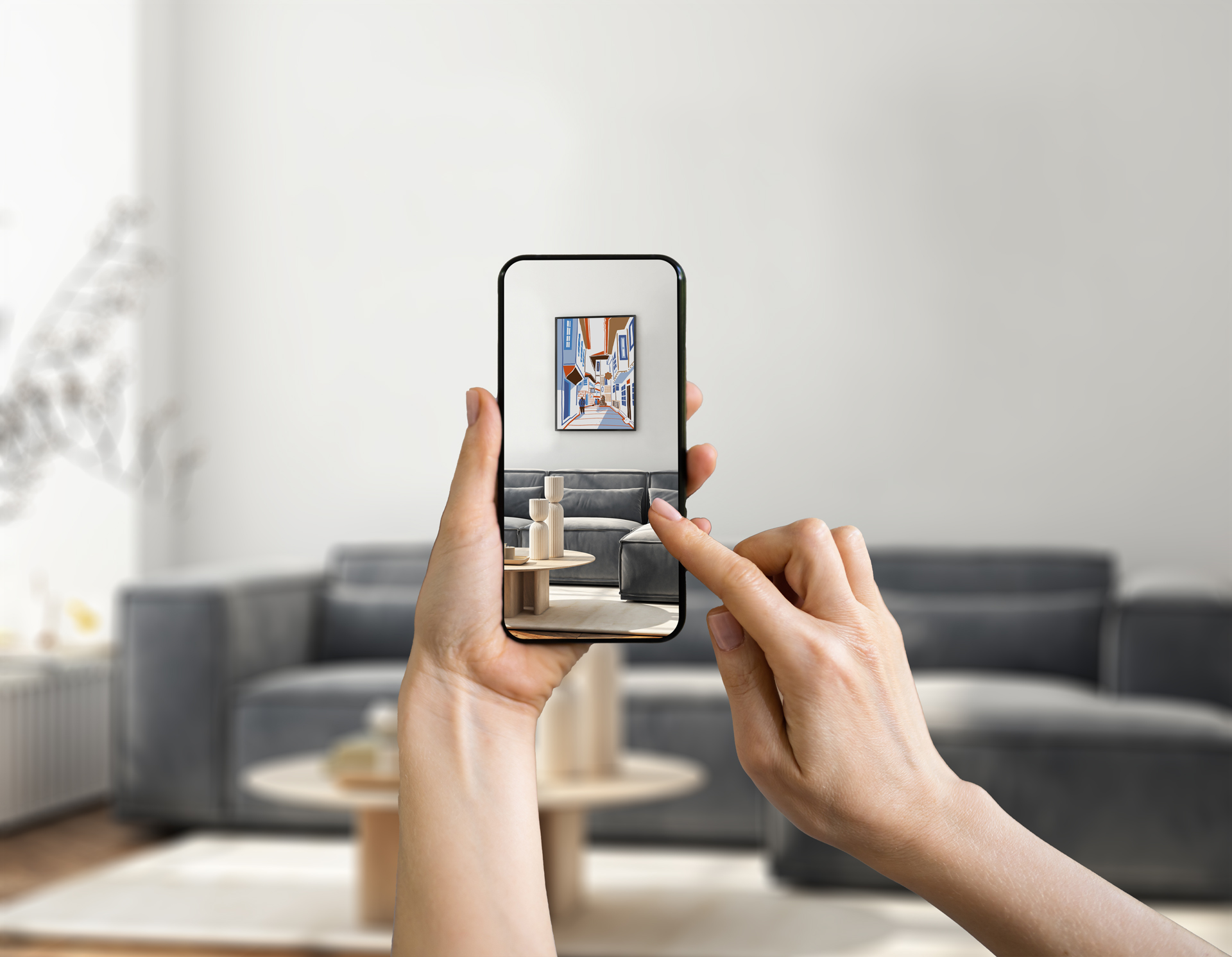 An image showcasing hands holding a phone and reviewing the product's final look with augmented reality.