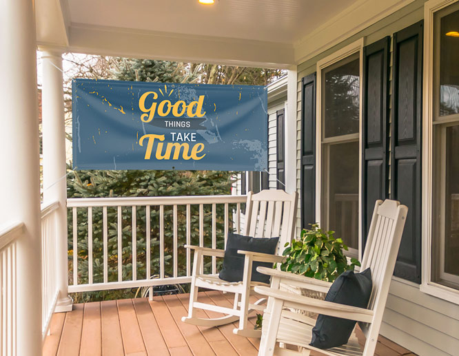 Large porch decorating idea with a hanging fabric display